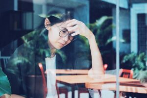 woman thinking about quitting alcohol