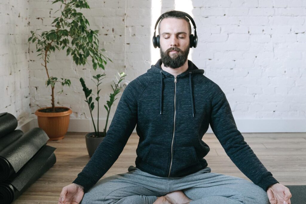 man listening to music as part of his healing for his Mental Health