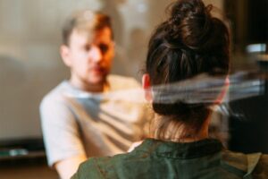 a male client speaking to a rehab staff regarding sponsorship