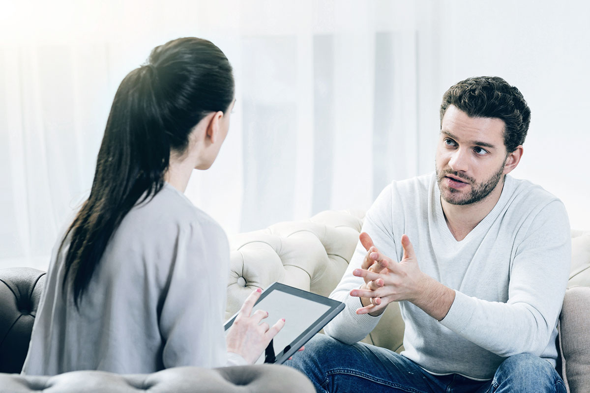 A male client engages in an individual therapy session at our rehab center, receiving personalized, one-on-one support to address the root causes of addiction.