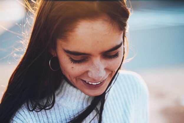 beautiful woman feeling grateful