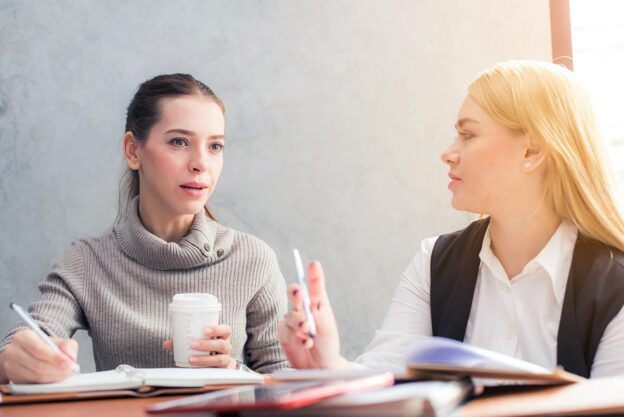 female listening to her friend's suggestion