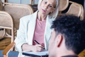 male client during detox assessment with a medical expert