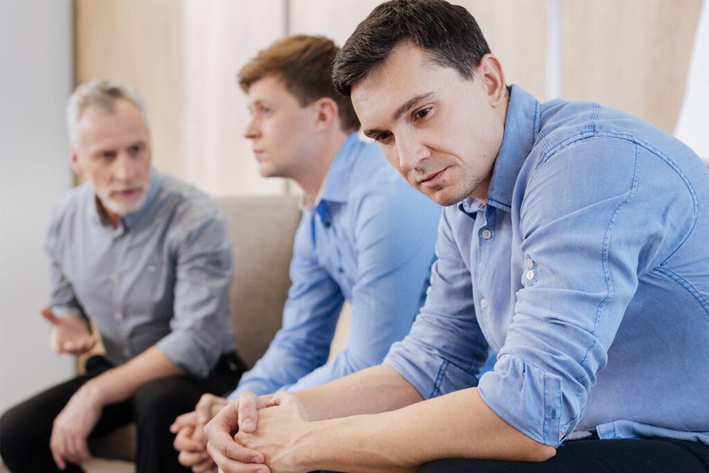 a male client together with a family member during an intervention