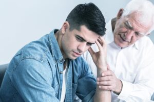 a father talking to his young adult